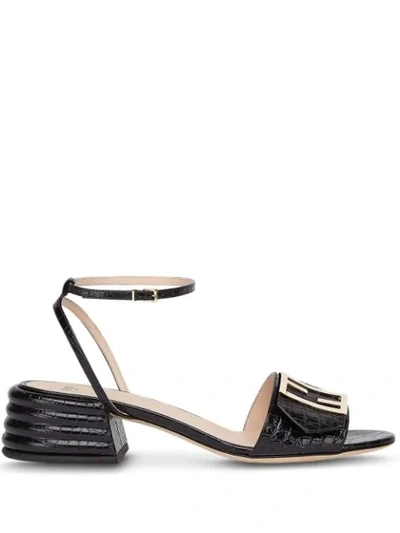 Shop Fendi Embossed Logo Plaque Sandals In Black