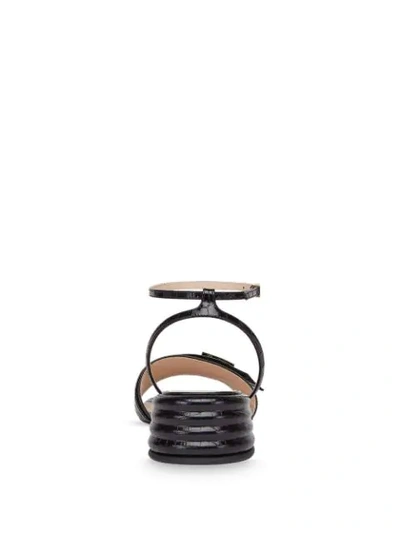 Shop Fendi Embossed Logo Plaque Sandals In Black