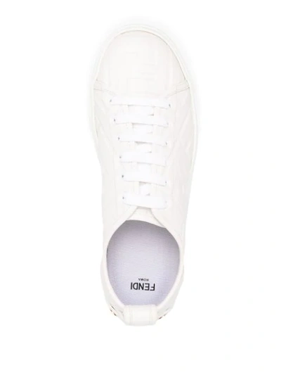 Shop Fendi Ff Embossed Low-top Sneakers In White