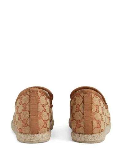 Shop Gucci Gg Print Loafers In Neutrals