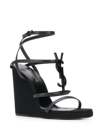 Shop Saint Laurent Opyum Wedge Sandals In Black