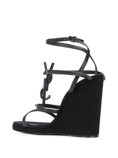 Shop Saint Laurent Opyum Wedge Sandals In Black