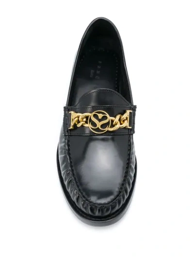 Shop Sandro Chain-embellished Loafers In Black