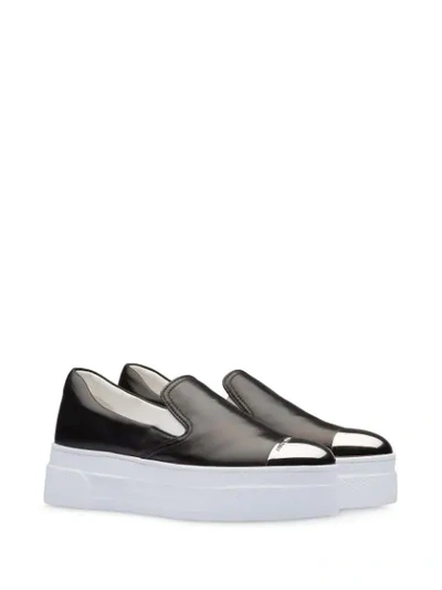 Shop Miu Miu Contrasting Toe-cap Sneakers In Black