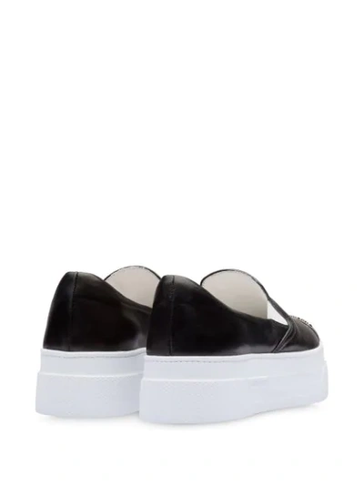 Shop Miu Miu Contrasting Toe-cap Sneakers In Black
