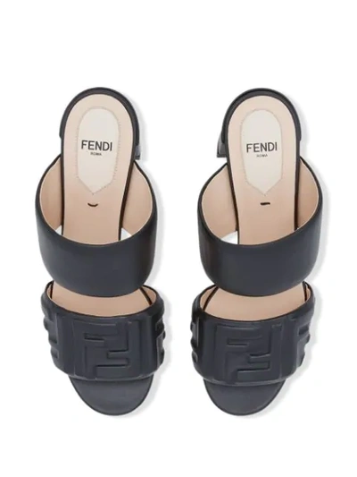 Shop Fendi Ff Embossed Mule Sandals In Black
