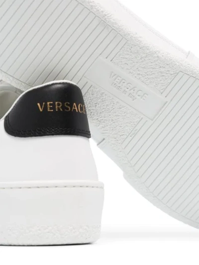 Shop Versace Ilus Sneakers In White