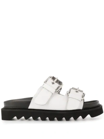 Shop Moschino Logo Plaque Buckled Sandals In White