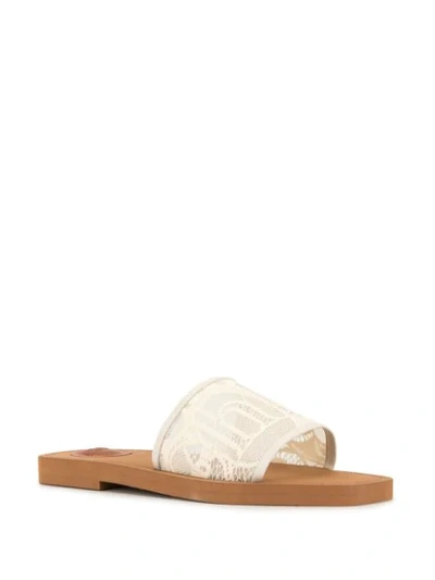 Shop Chloé Woody Lace Sliders In White