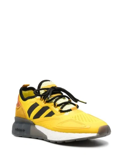 Shop Adidas Originals Ninja Zx 2k Boost Jr Trainers In Yellow