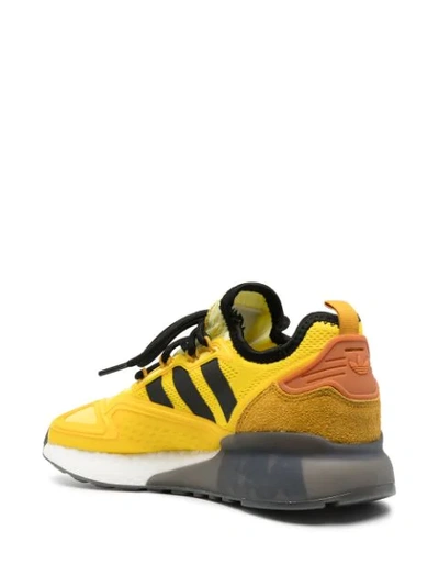 Shop Adidas Originals Ninja Zx 2k Boost Jr Trainers In Yellow