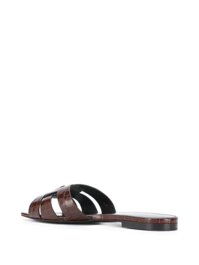 Shop Saint Laurent Tribute Crocodile-embossed Slide Sandals In Brown