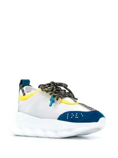 Shop Versace Chain Reaction Sneakers In White