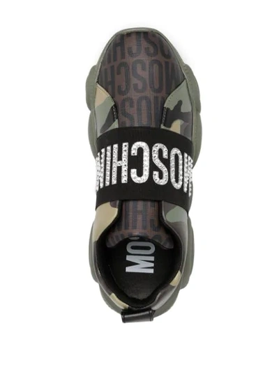 Shop Moschino Lost Found Sneakers In Green