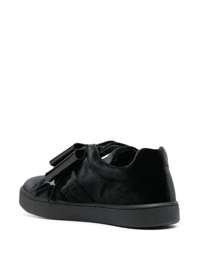 Shop Moschino Bow-detail Sneakers In Black