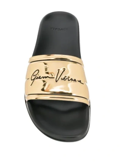 Shop Versace Gv Signature Slides In Gold
