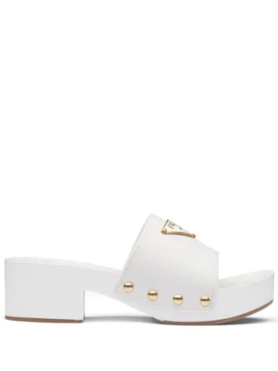 Shop Prada Logo Plaque Clog Sandals In White