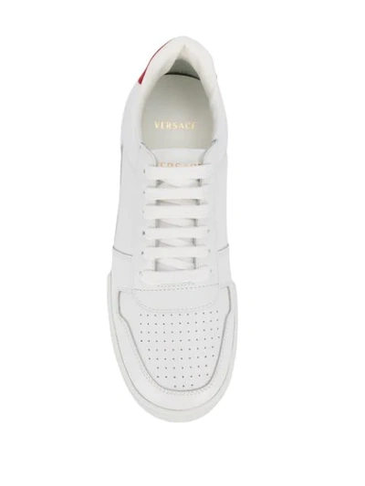 Shop Versace Contrast Heel Counter Sneakers In White