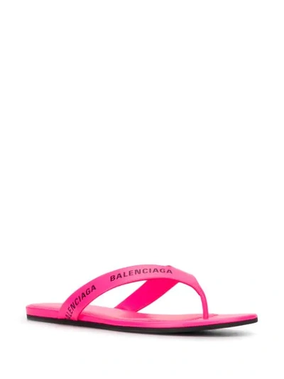 Shop Balenciaga Printed Logo Flip Flops In Pink