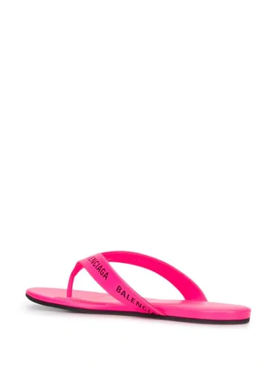 Shop Balenciaga Printed Logo Flip Flops In Pink
