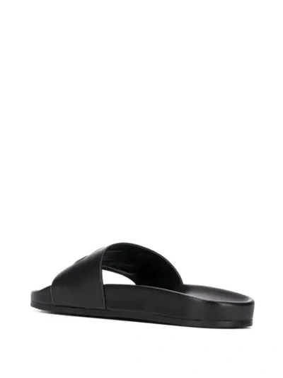 Shop Balenciaga Bb Embossed Logo Slides In Black