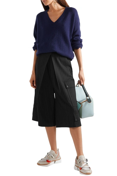 Shop Jw Anderson Pleated Pinstriped Wool-blend Flannel Culottes In Black
