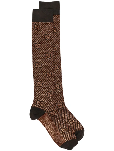 Shop Gucci Glitter Gg Knee-high Socks In Brown