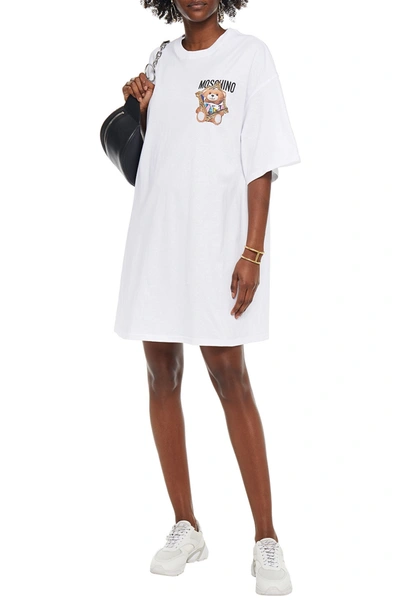 Shop Moschino Oversized Distressed Printed Cotton-jersey Mini Dress In White