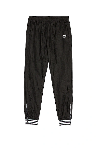 Shop Adidas X Human Made Tyvek Track Pants In Black