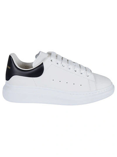 Shop Alexander Mcqueen Round Toe Classic Lace-up Sneakers In White/black