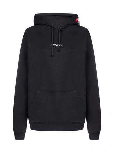 Shop Vetements Logo Patch Cotton Hoodie In Black