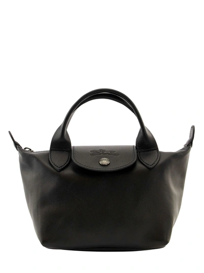 Shop Longchamp Le Pliage Cuir - Top Handle Bag Xs In Black/ebony