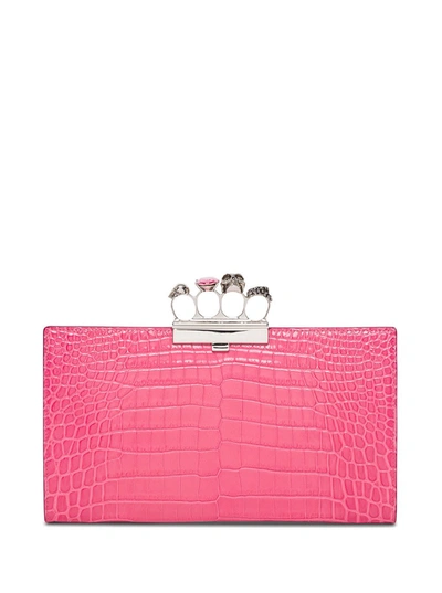 Shop Alexander Mcqueen Four Rings Skull Clutch In Crocodile Print Leather In Pink