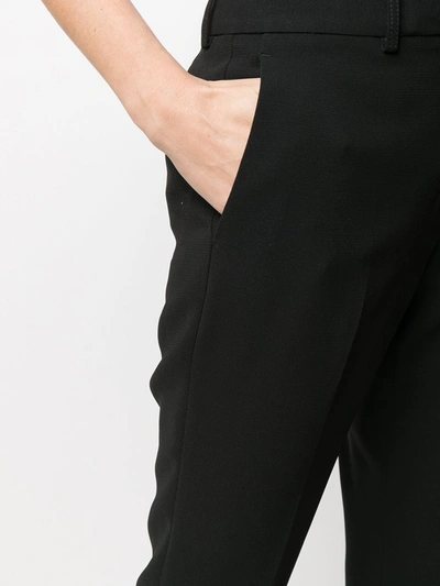 Shop Dkny Cropped Slim-cut Trousers In Black