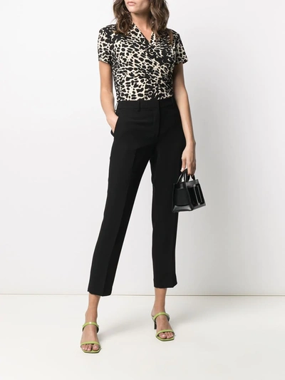 Shop Dkny Animal Print Wrap Style Top In Black