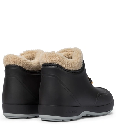 Shop Gucci Faux Shearling Rubber Ankle Boots In Black