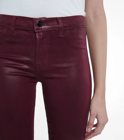 Shop J Brand Selena Coated Bootcut Cropped Jeans In Red