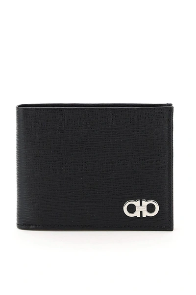 Shop Ferragamo Bi-fold Gancini Wallet In Black (black)