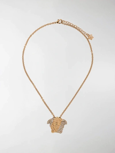 Shop Versace Crystal-embellished Medusa Necklace In Gold