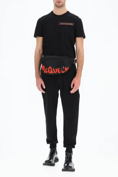 Shop Alexander Mcqueen Sweatpants With Logo Selvedge In Black