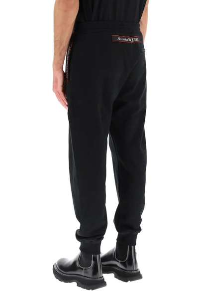 Shop Alexander Mcqueen Sweatpants With Logo Selvedge In Black