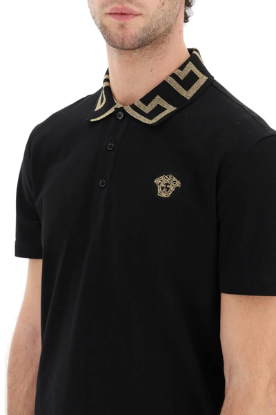 Shop Versace Polo Shirt With Golden Greca In Black,gold