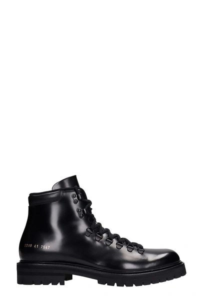 Shop Common Projects Hiking Combat Boots In Black Leather