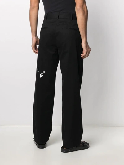 Shop Palm Angels Broken Logo Chinos In Black