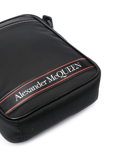 Shop Alexander Mcqueen Medium Logo-tape Messenger Bag In Black