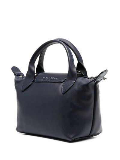 Shop Longchamp Extra Small Le Pliage Cuir Top Handle Bag In Blue