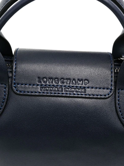 Shop Longchamp Extra Small Le Pliage Cuir Top Handle Bag In Blue