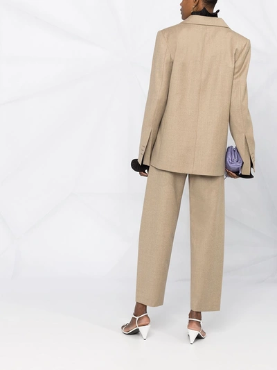 Shop Totême Carrot Leg Trousers In Neutrals