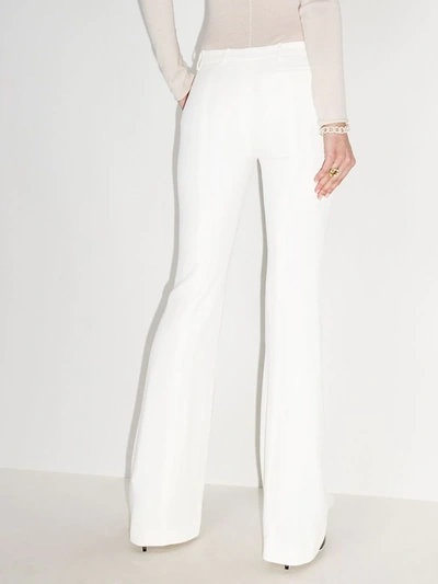Shop Alexander Mcqueen Flared Trousers - Women's - Cupro/viscose In White