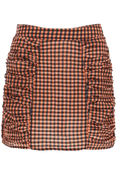 Shop Ganni Seersucker Check Mini Skirt In Black,red,brown